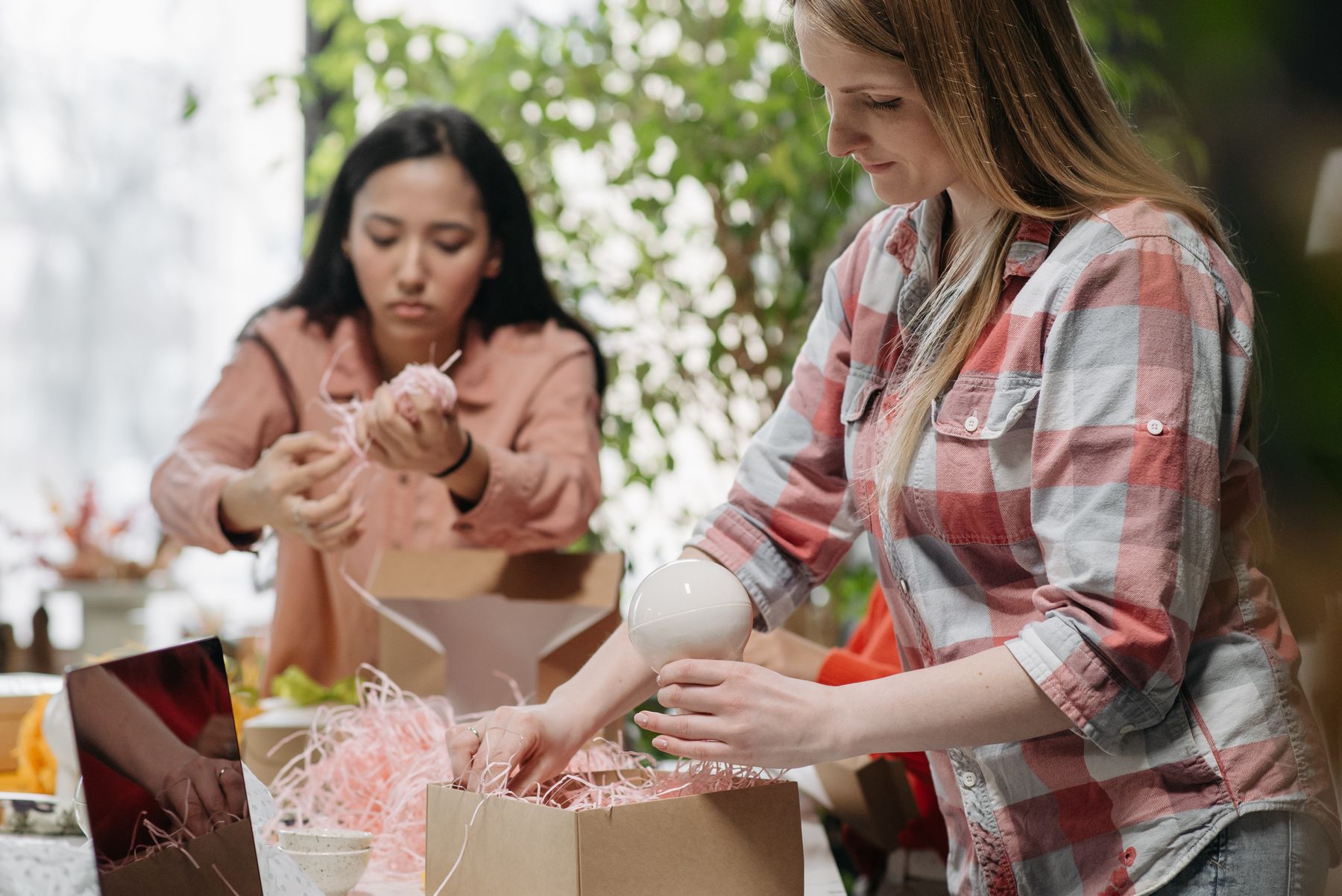 Store operators preparing commerce orders and follow-up
